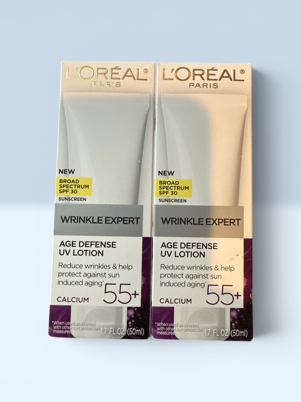 L'Oreal Wrinkle Expert Age Defense UV Lotion - White, Cream, Purple